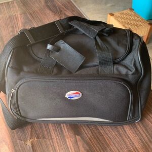 Vintage American Tourister carry on